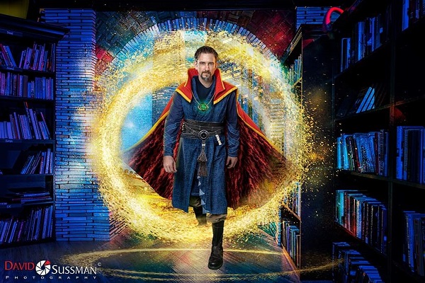 A photo of Scott Hill dressed in Dr. Strange attire, professionally edited and taken by David Sussman. Cosplay Marvel DC Comic Book Lovers Professional Photography Gallery Local Artist Book Arch in Sandman Books Punta Gorda Florida. Florida Tourism Tourist Local Art Artist Artwork Fantasy Harry Potter Beauty and the Beast Disney Wedding Photography Unconventional Unique Venue Sell Used New Books Bookstore Bookshop Library  