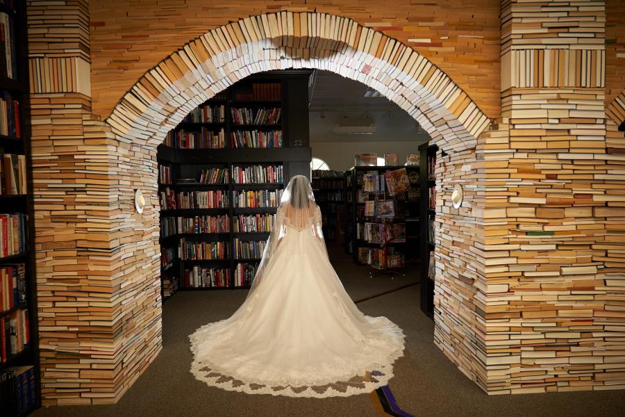 Wedding Sandman Books Book Arch Engagement Proposal Wedding Bridal Honeymoon Florida Punta Gorda Sandman Books Bookstore Library Wedding Fantasy Unique Unconventional Venue Fairy Tale Wedding